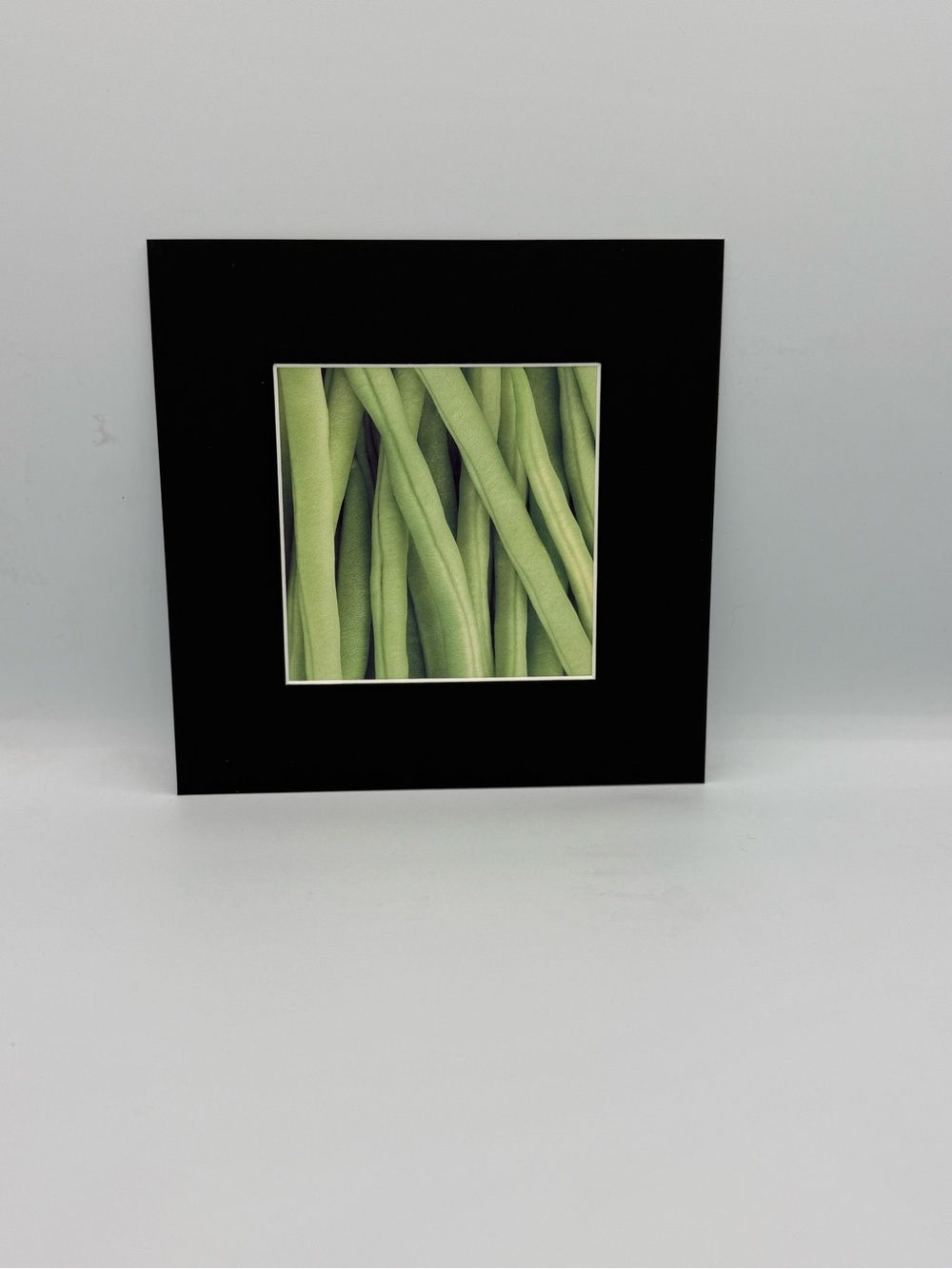 8”x8” Green Bean Wall Art with a Black Mat
